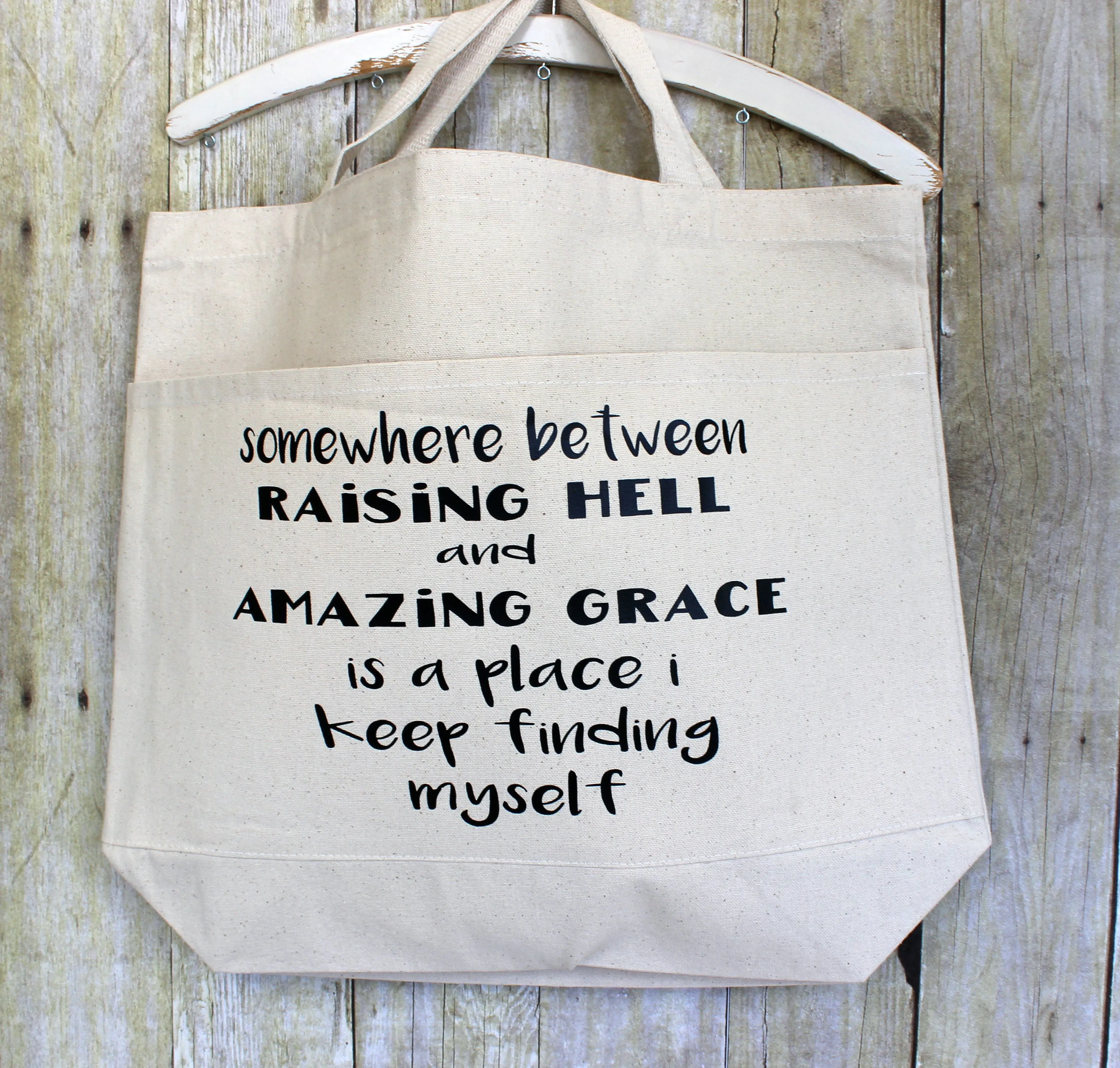 raising hell and amazing grace - tote bag