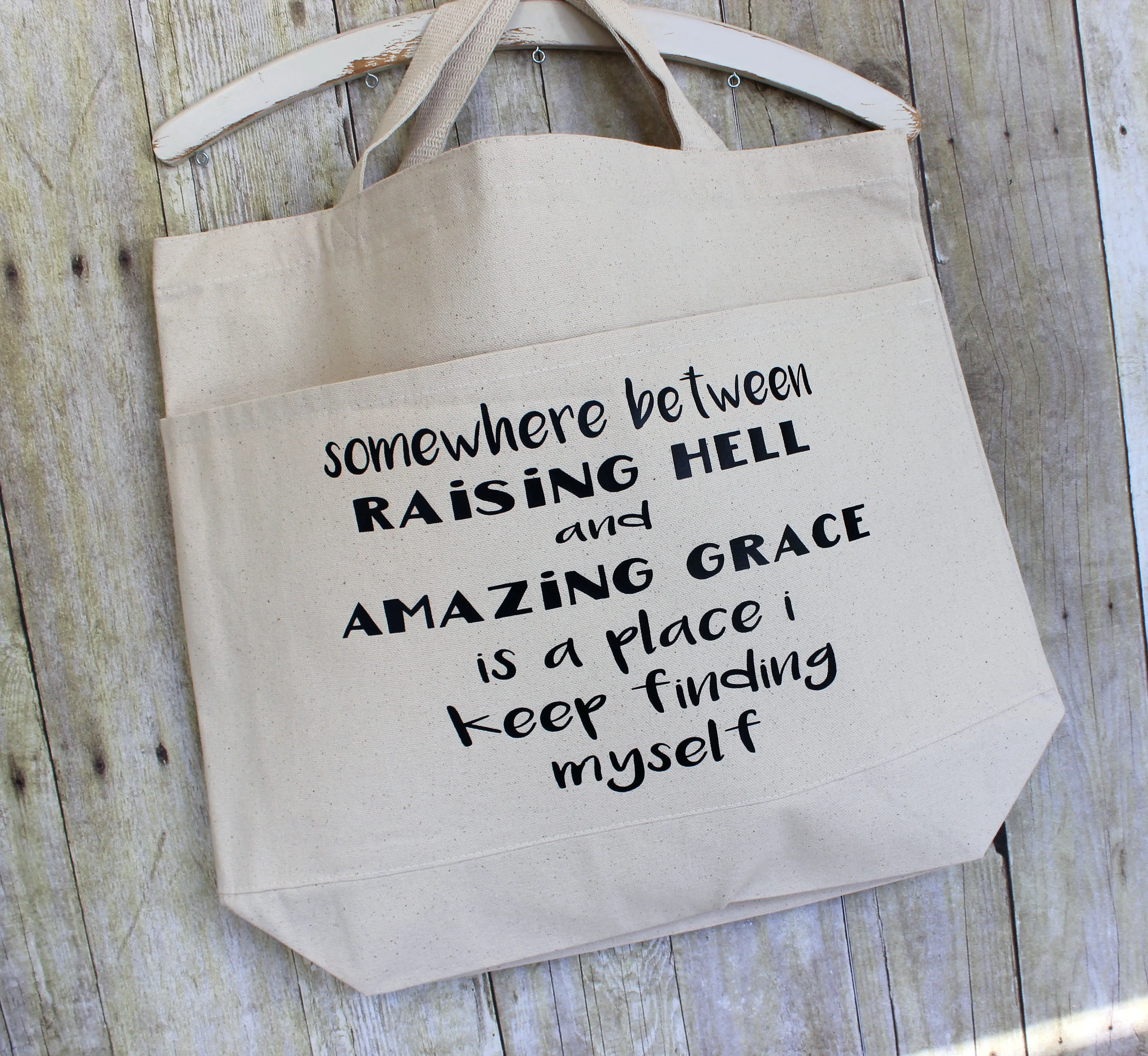 raising hell and amazing grace - tote bag