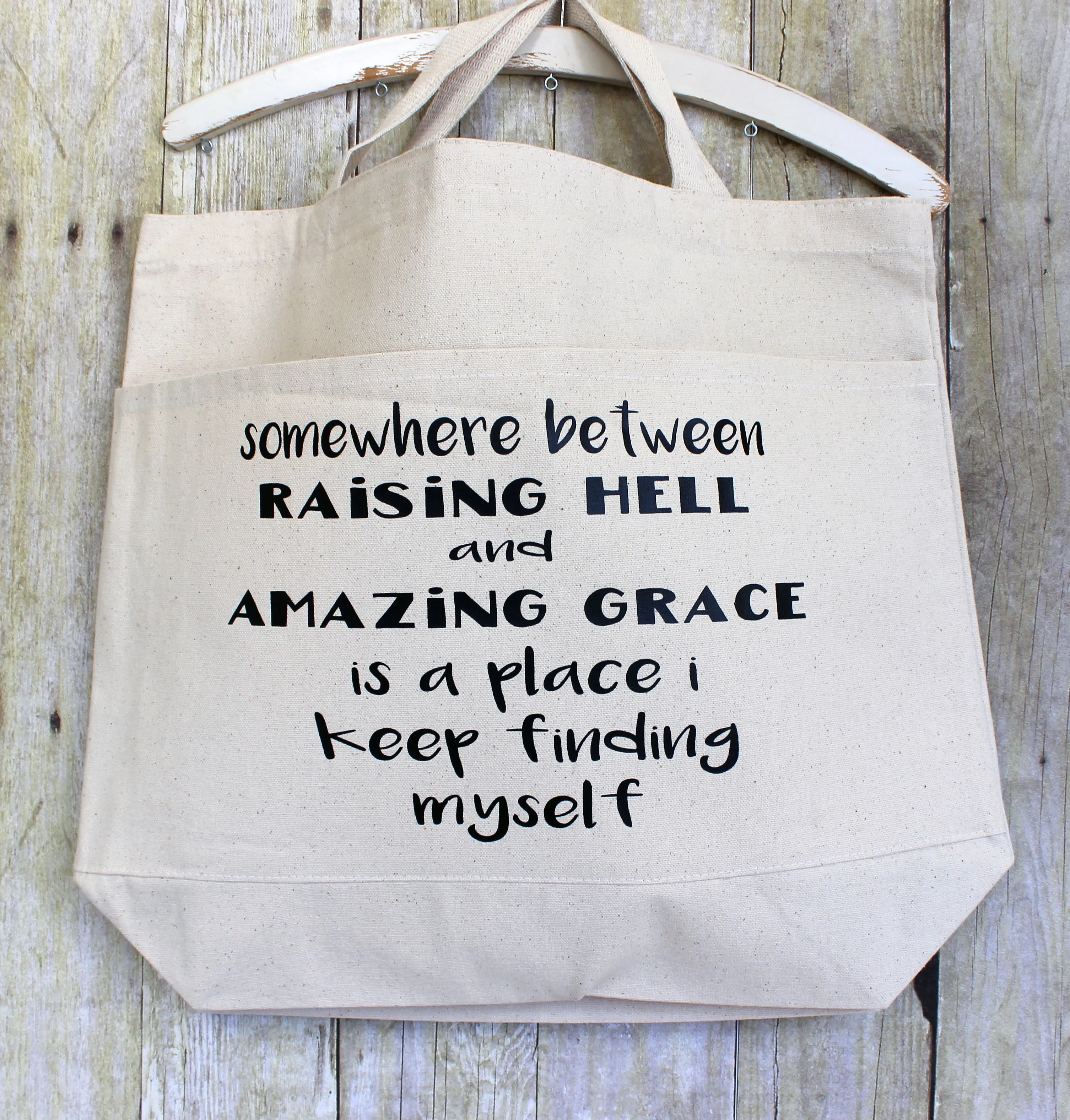 raising hell and amazing grace - tote bag